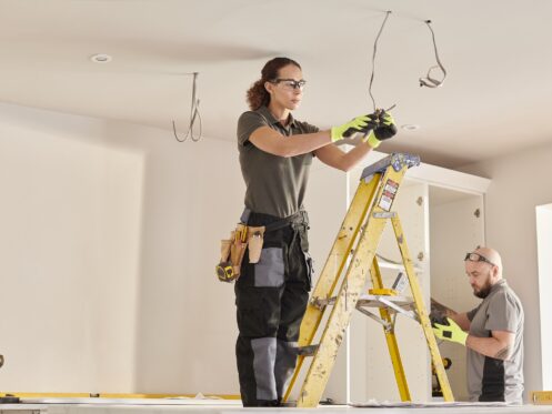 electrician working in a kitchen remodeling